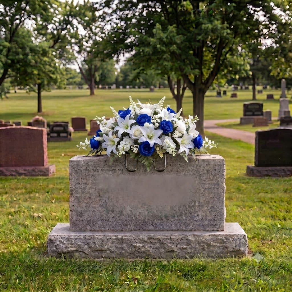 Tombstone Saddle: Lilies & Roses (Blue & White) on a headstone