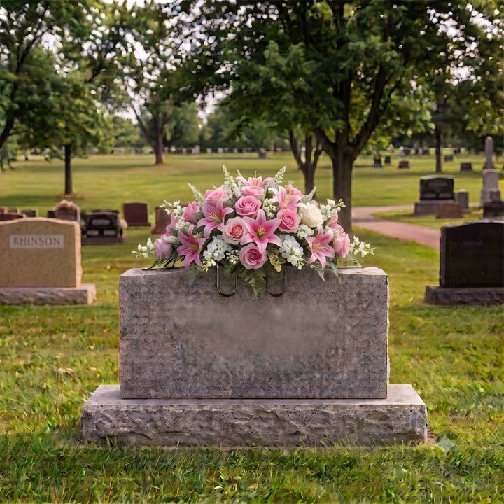 Tombstone Saddle: Lilies & Roses (Pink) on a headstone