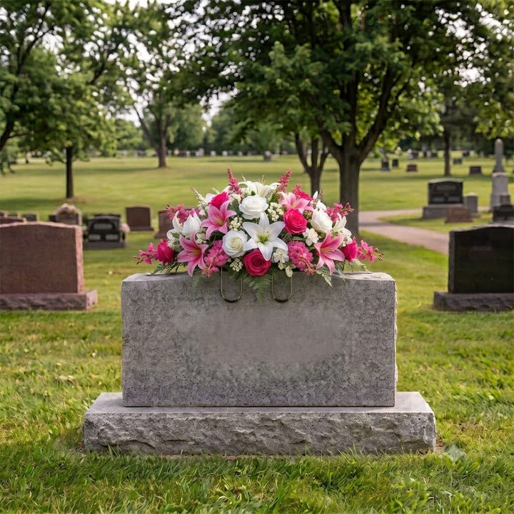 Tombstone Saddle: Lilies & Roses (Hot Pink & White) on a headstone