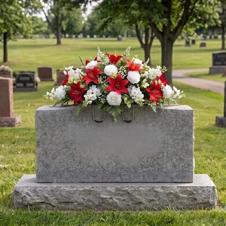 Tombstone Saddle: Lilies & Roses (Red & White) - artificial memorial flowers on a headstone