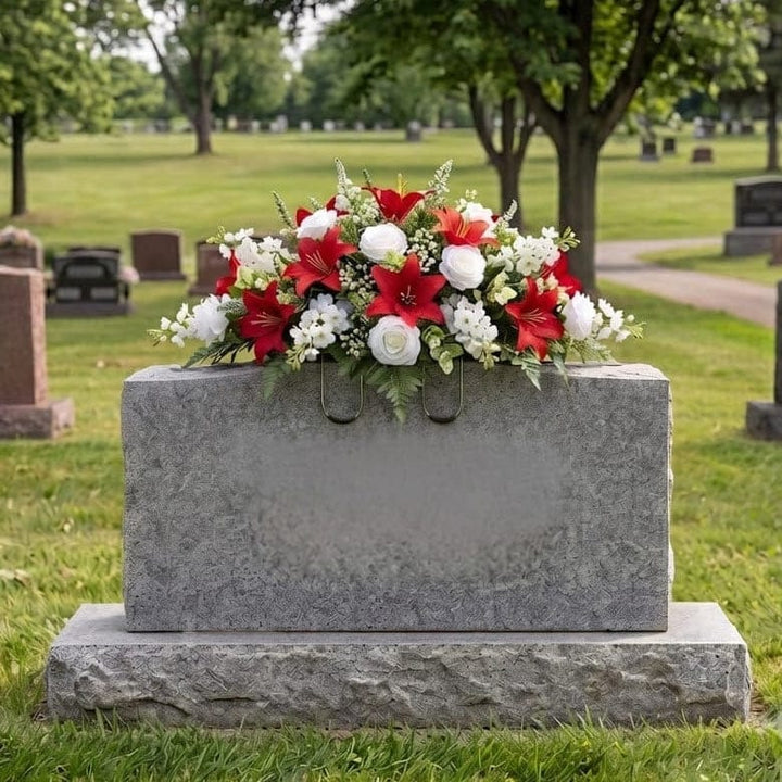 Tombstone Saddle: Lilies & Roses (Red & White) - artificial memorial flowers on a headstone