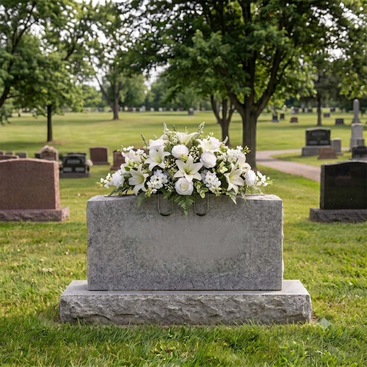 Tombstone Saddle: Lilies & Roses (White) on a headstone