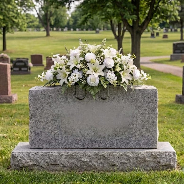 Tombstone Saddle: Lilies & Roses (White) - artificial memorial flowers on a headstone