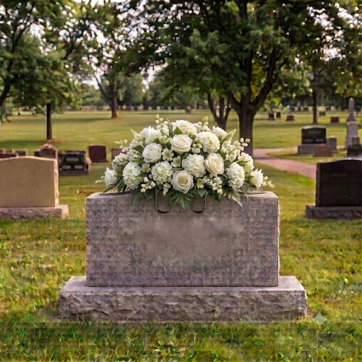 Tombstone Saddle: Roses & Hydrangeas (White) on a headstone