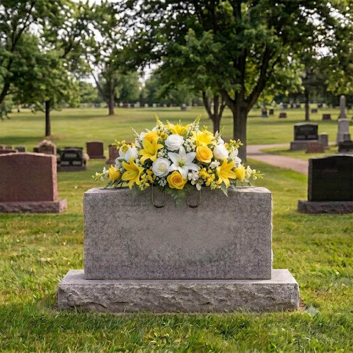 Tombstone Saddle: Lilies & Roses (Yellow & White) on a headstone