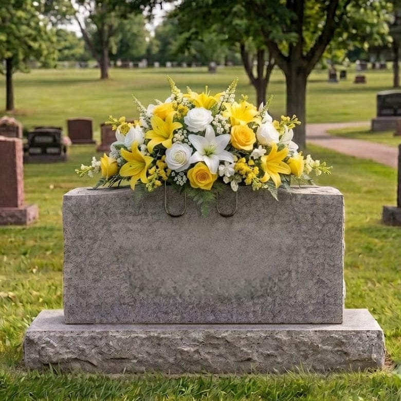 Tombstone Saddle: Lilies & Roses (Yellow & White) - artificial memorial flowers on a headstone