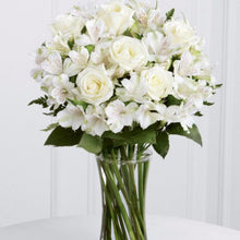 Beautiful white roses and alstroemeria are accented beautifully arranged and hand tied to create an elegant gift that is ready to display straight away. Toronto Online Flower Delivery Service for Luxury Roses providing free delivery in the greater Toronto area for Birthdays, Anniversary, New baby, Weddings, Mother’s Day and Valentines day